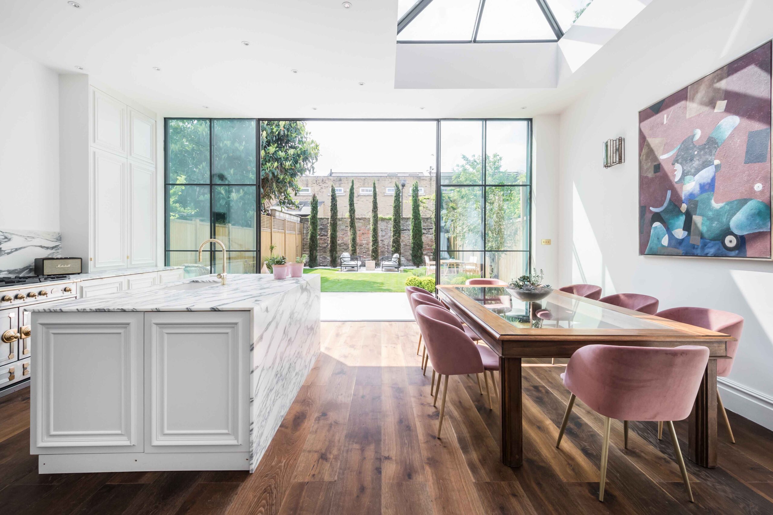 Boscombe Road W12 for rent London, open-plan kitchen and dining room with Crittall windows and a skylight