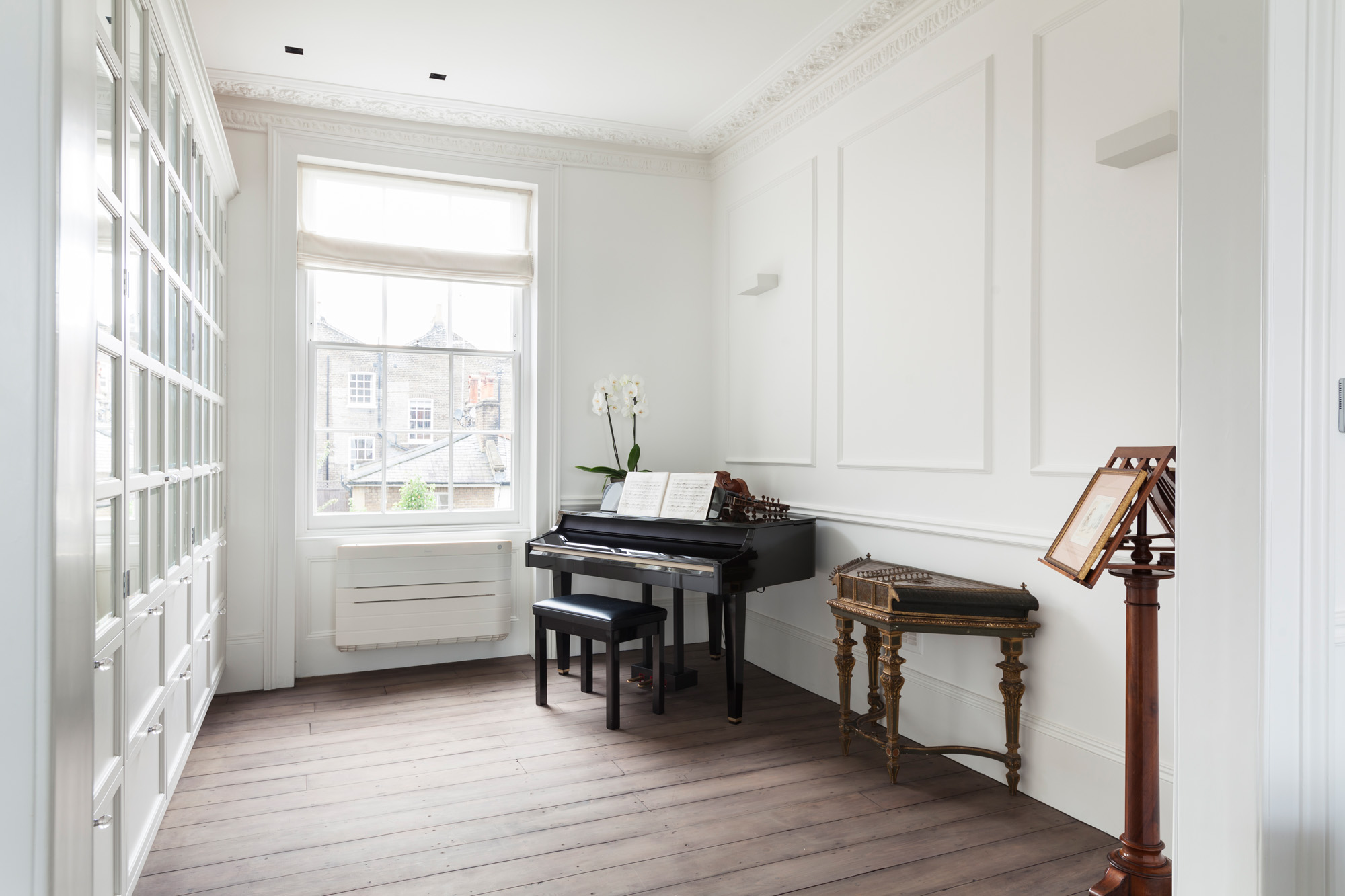 Minimalist interior design and piano Hereford Road Notting Hill W2