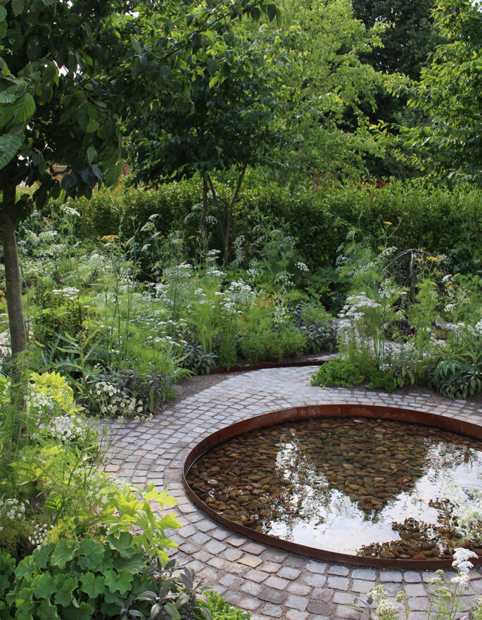 Luxury garden design and pond by Alexandra Noble