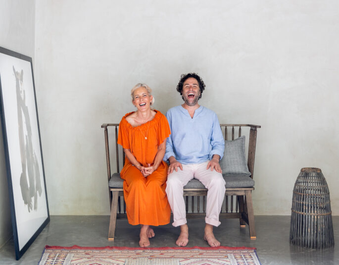 A couple sat in a design-led house in London