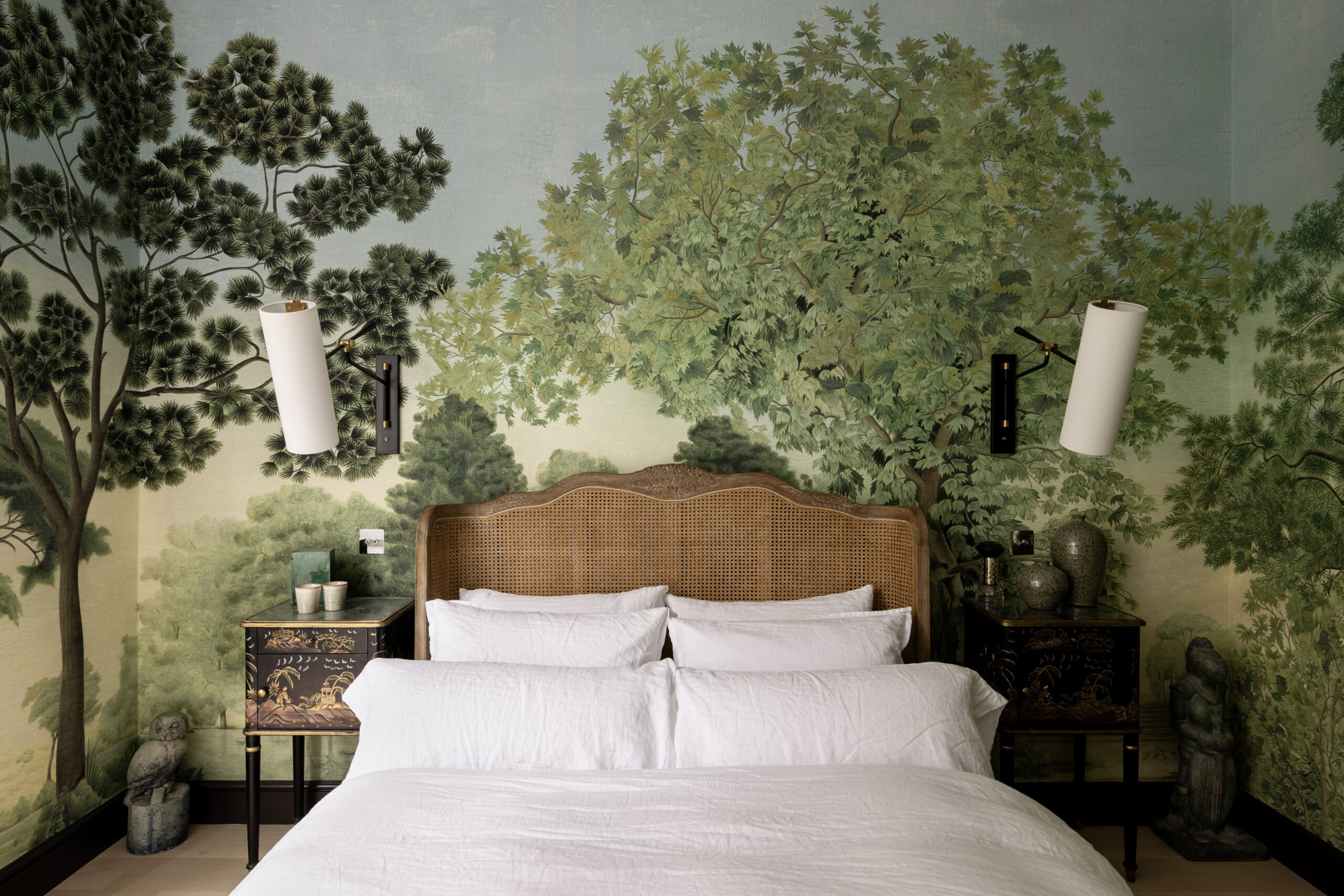 Luxury principal bedroom suite with a leafy wall mural in a two-bedroom garden apartment for sale in West Kensington
