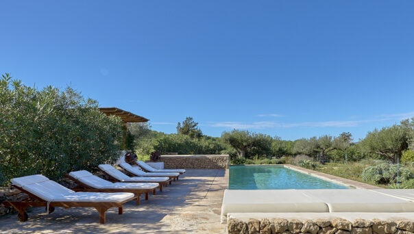Pool and chillout area of a luxury villa for sale in Ibiza