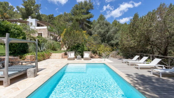 Swimming pool and main villa at Can Ambel in Ibiza