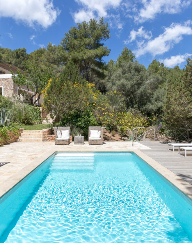Swimming pool and main villa at Can Ambel in Ibiza