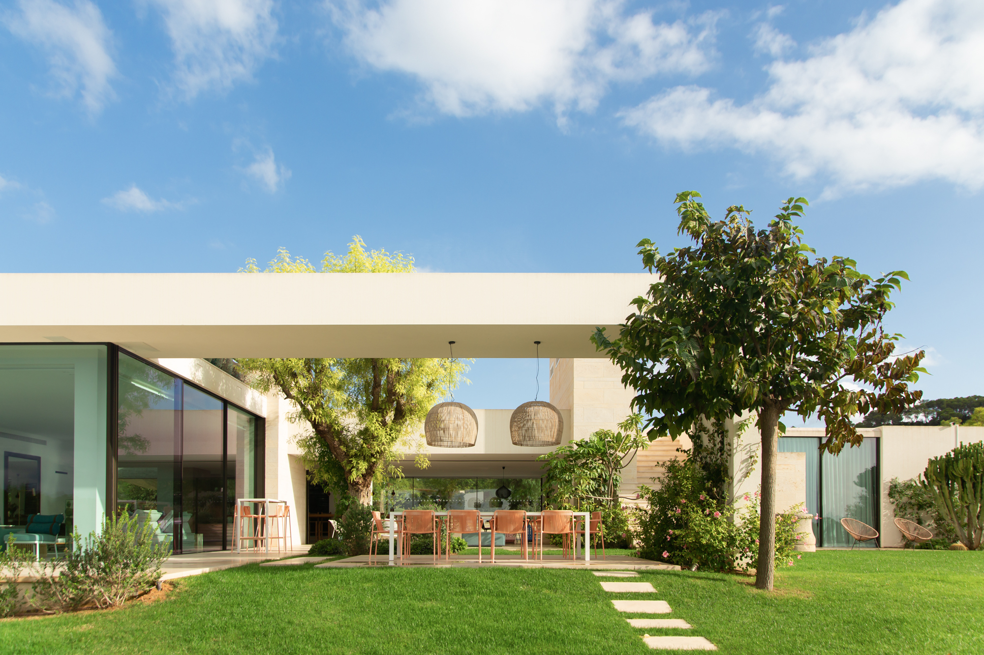 The exterior of a dramatic rental villa in Ibiza