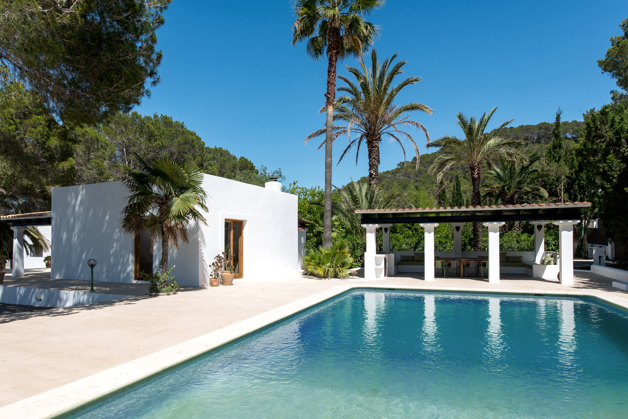 Pool and lounge area at a villa for sale in central Ibiza