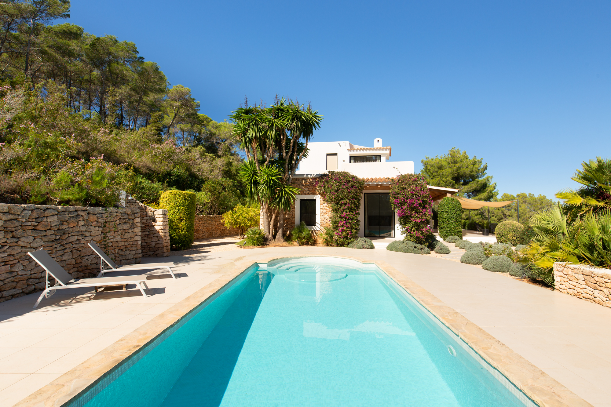 Straight view of a pool at a luxury villa for sale in Ibiza