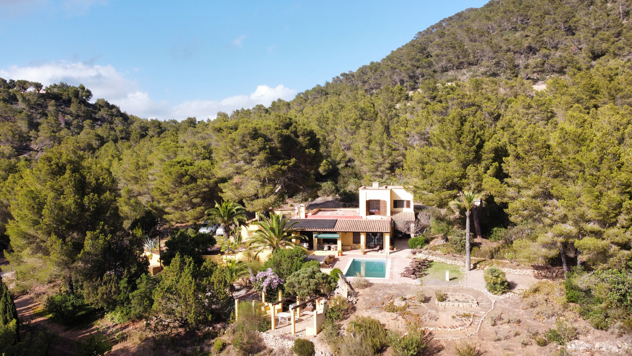 Aerial view of Casa Monala Es Vedra, a luxury villa for sale in Ibiza