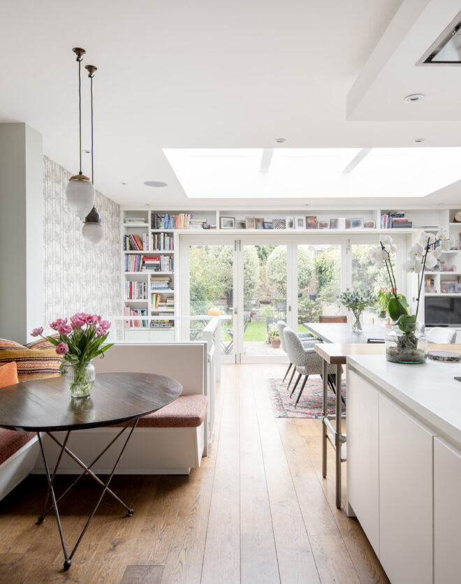 Luxury open-plan kitchen and dining room of a four-bedroom home for sale in Hammersmith