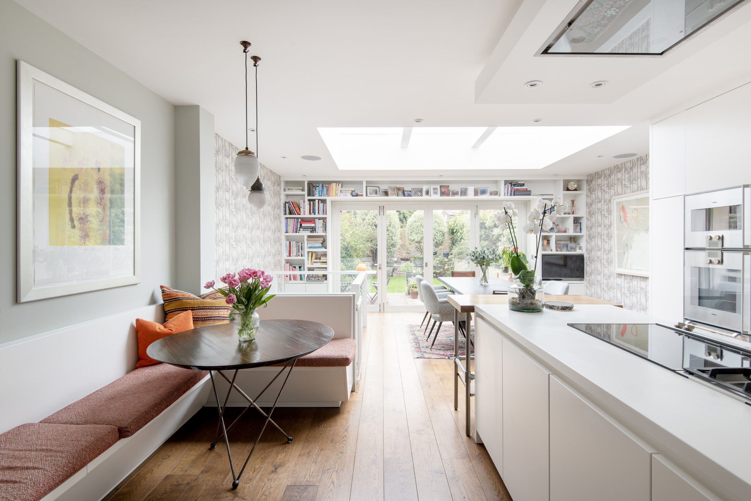Luxury open-plan kitchen and dining room of a four-bedroom home for sale in Hammersmith
