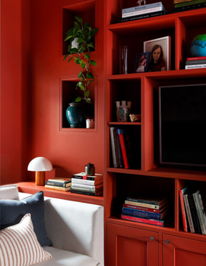 Red shelves by Christian Bense