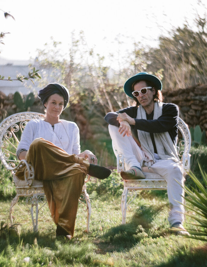 Designers Diego and Alexeja sat in a garden © Tasya Menaker