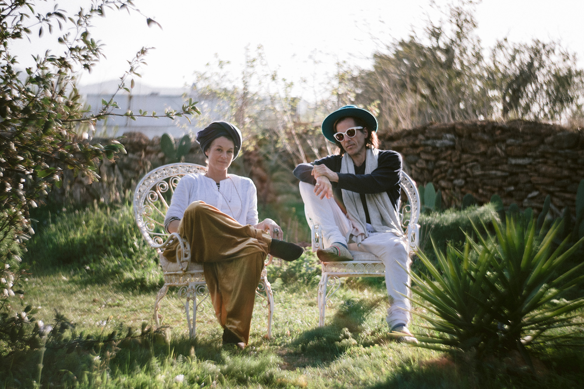 Designers Diego and Alexeja sat in a garden © Tasya Menaker