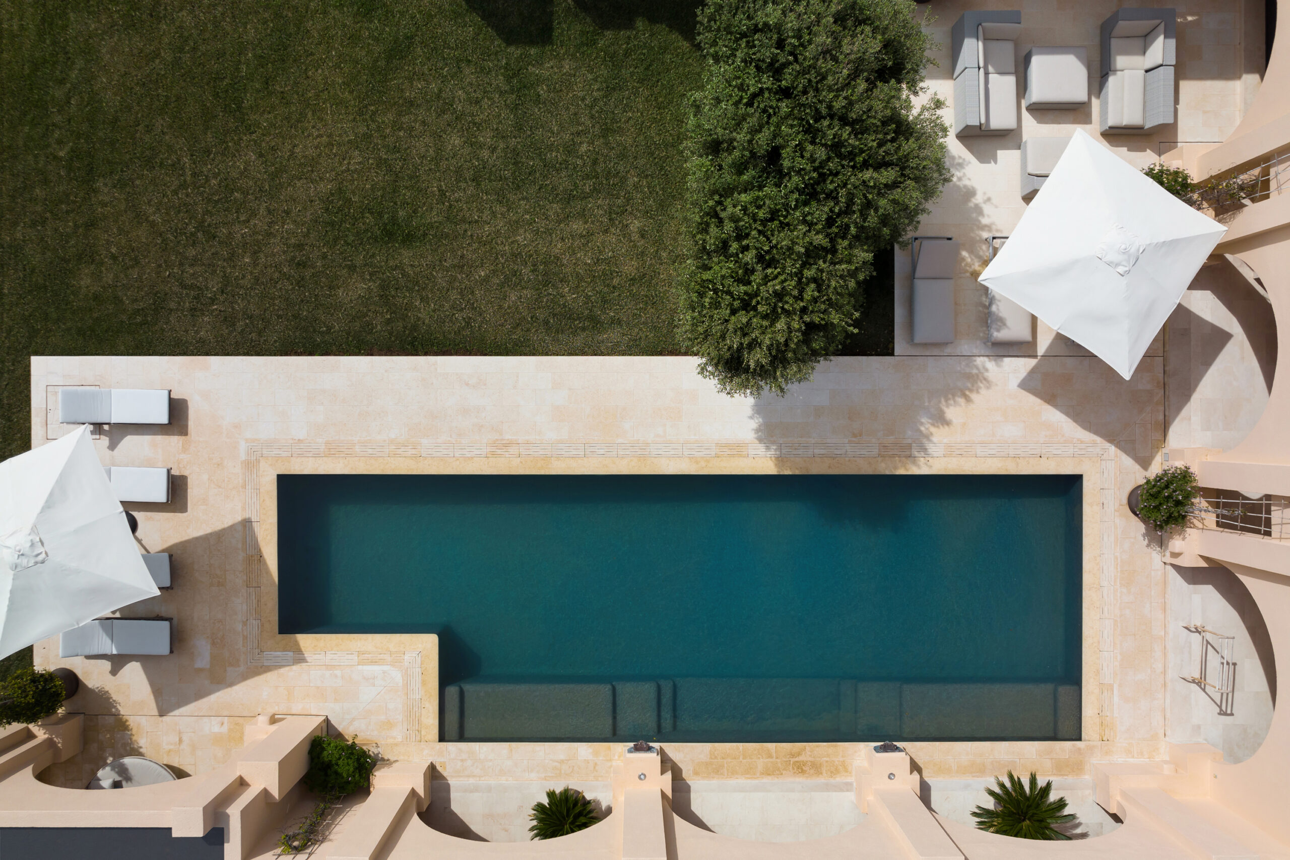 Bird's eye view of a swimming pool at a luxury villa in Ibiza
