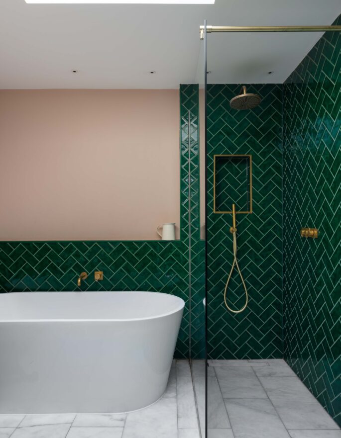 Kensington Park Road bathroom with freestanding tub and green parquet tiles