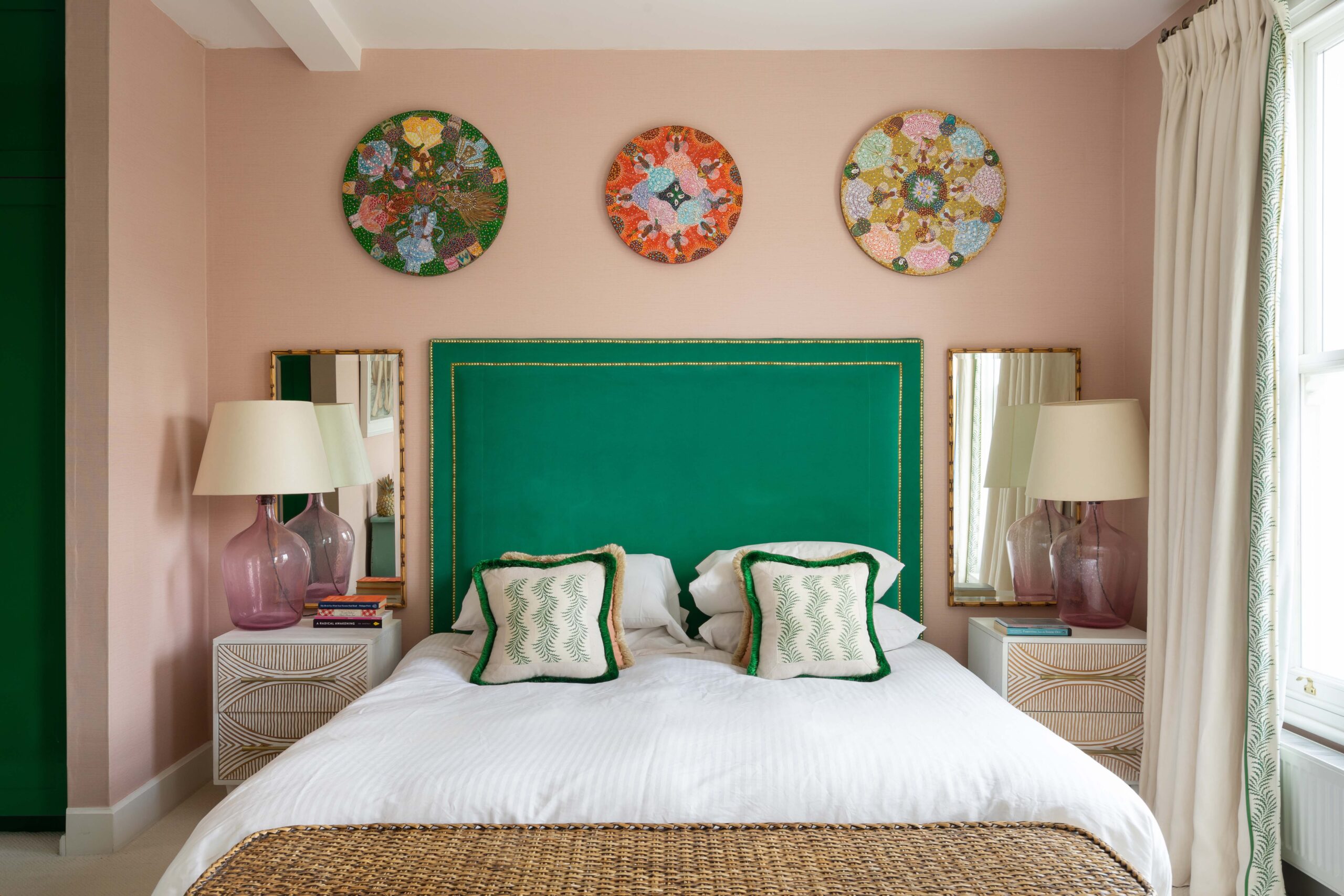 Kensington Park Road master bedroom with green headboard and pink walls