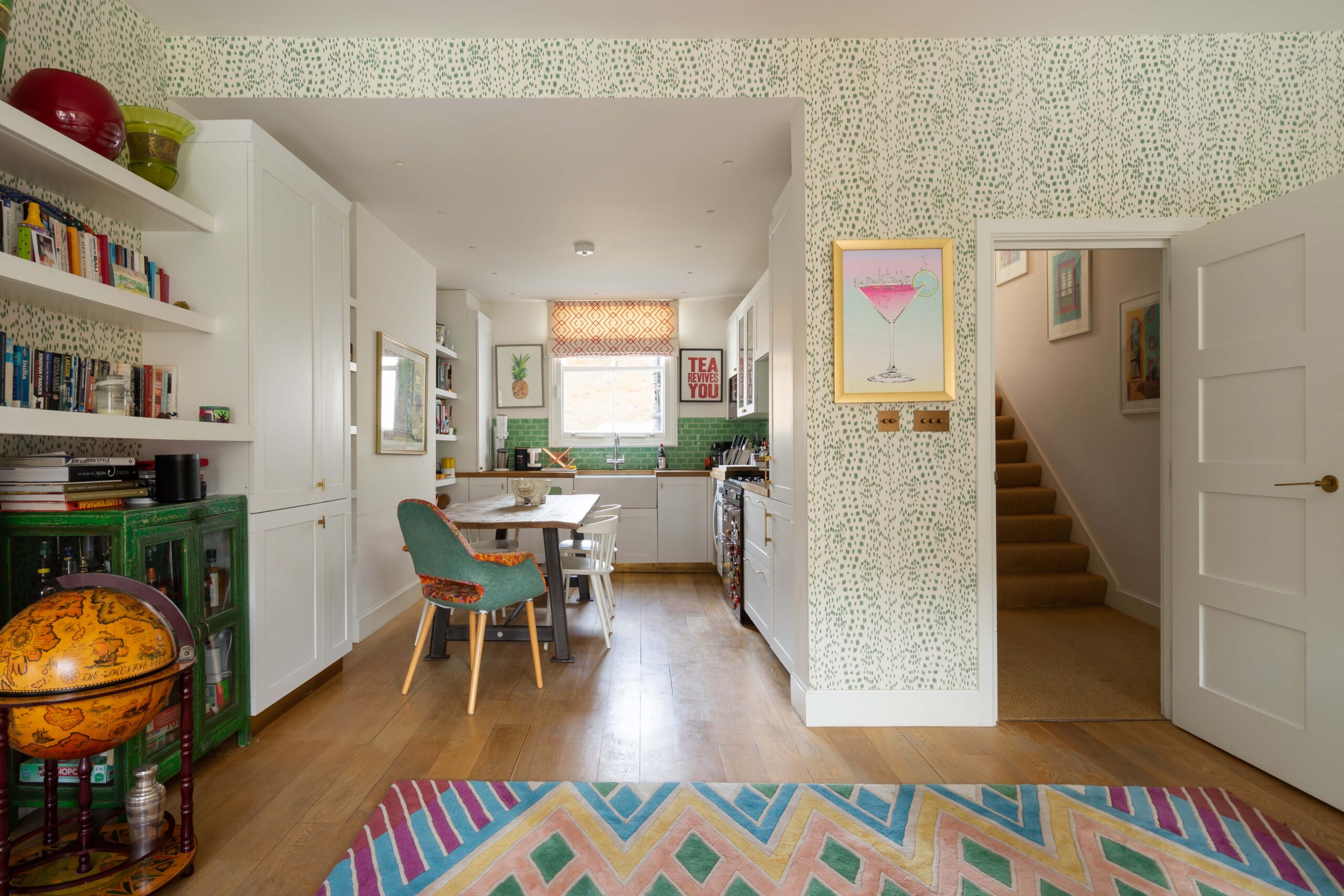 Kensington Park Road open-plan kitchen with patterned wallpaper