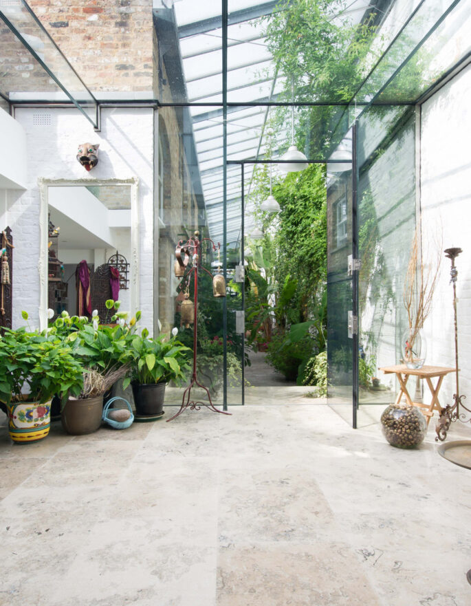 For Sale: St Stephen Yard Notting Hill W11 glass extension with house plants and minimalist decor