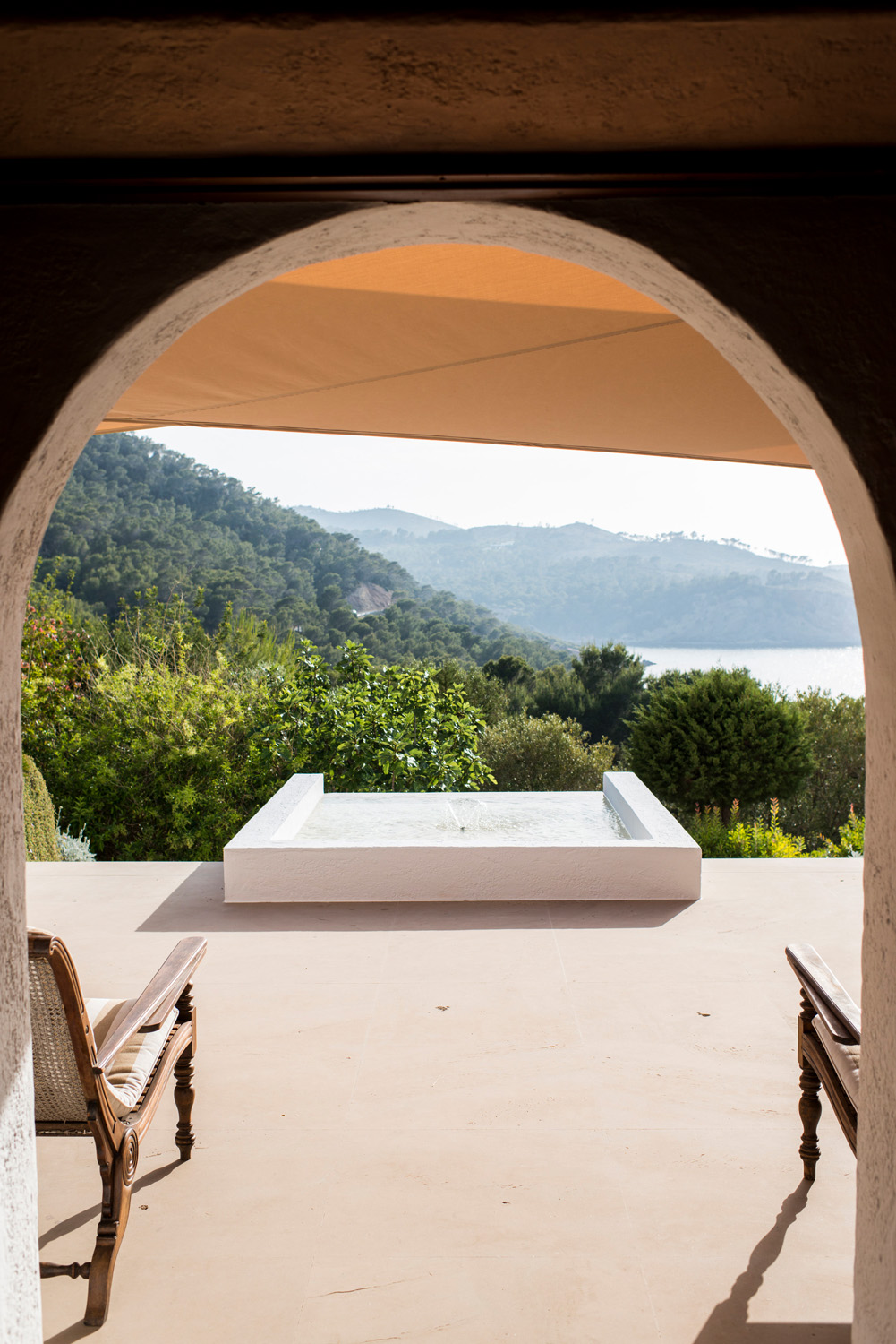 View through an archway and out to the exterior of a luxury villa in Ibiza