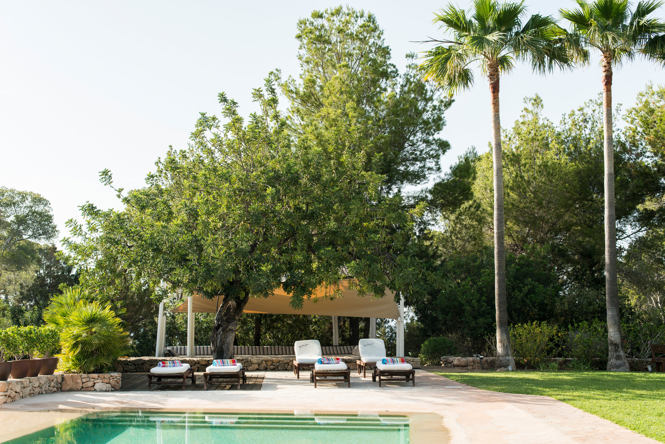 Pool and gardens of a luxury villa on Ibiza