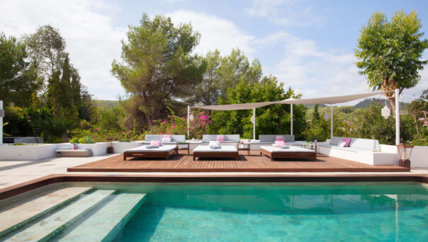 Steps lead into the pool of a private rental villa in Ibiza