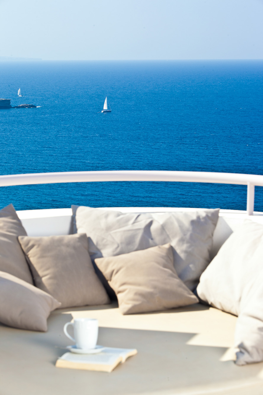 View over the sea from the day bed of a luxury holiday home in Ibiza