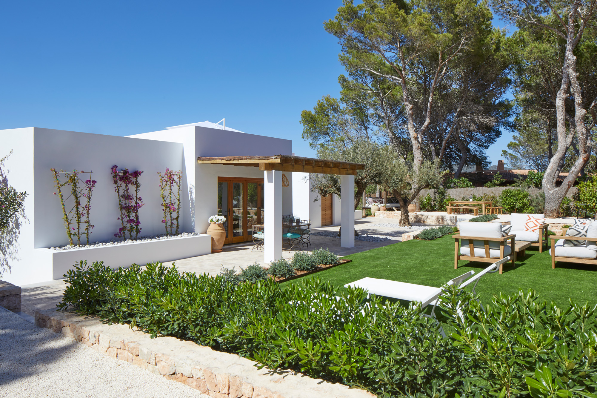 Exterior and landscaped gardens of a private villa in Ibiza