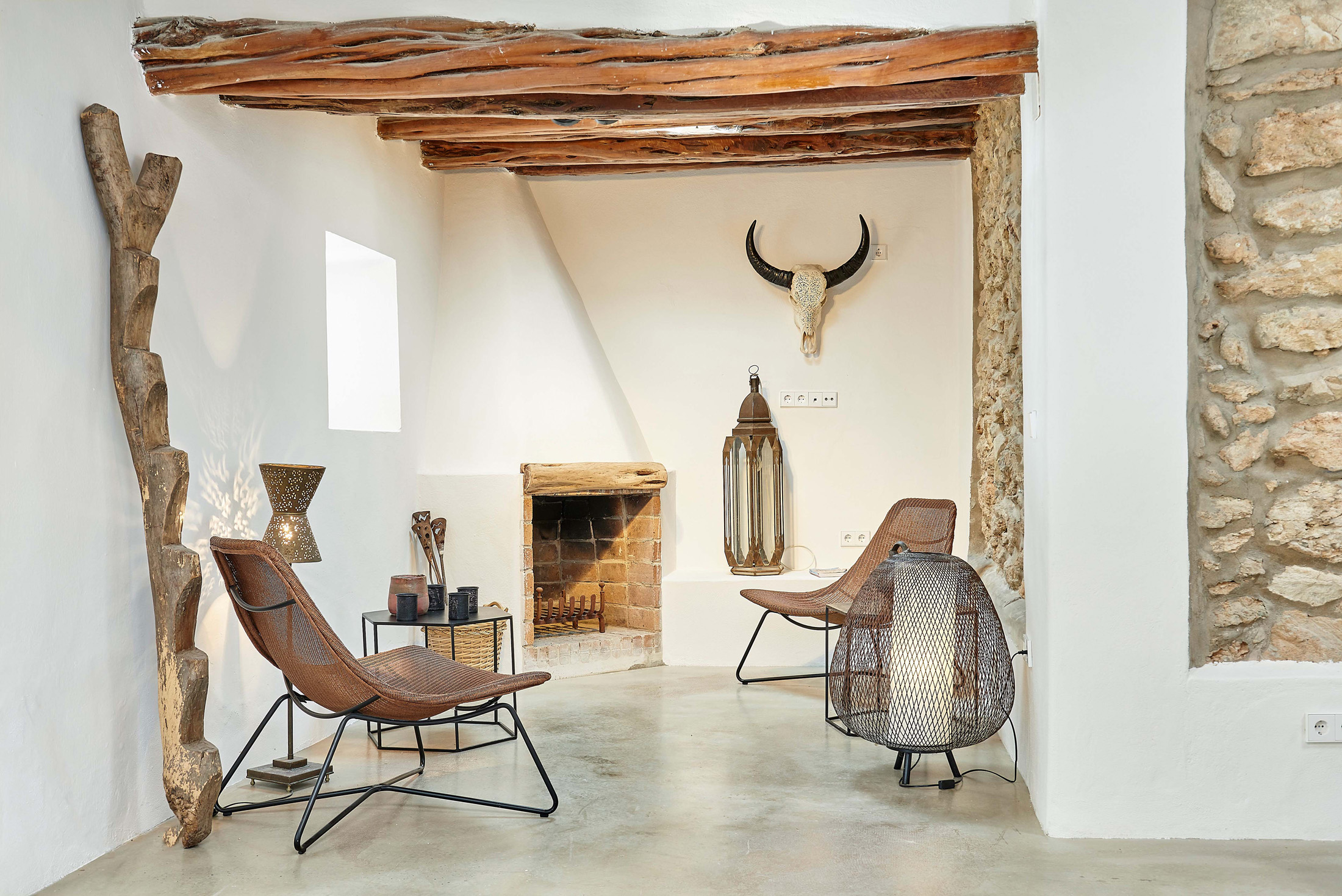 Dramatic whitewashed living room of a luxury holiday home in Ibiza