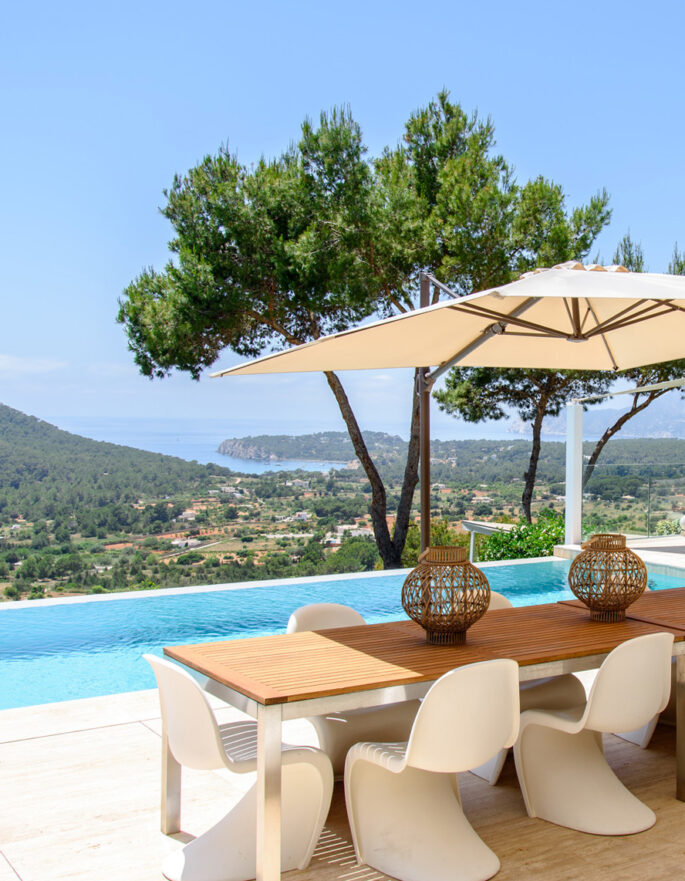 Dining terrace and pool of an upscale Ibiza villa