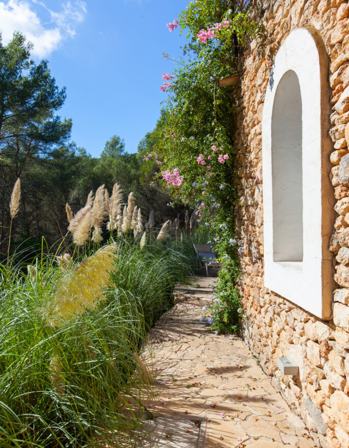 Exterior pathway alongside a luxury villa for sale in Ibiza
