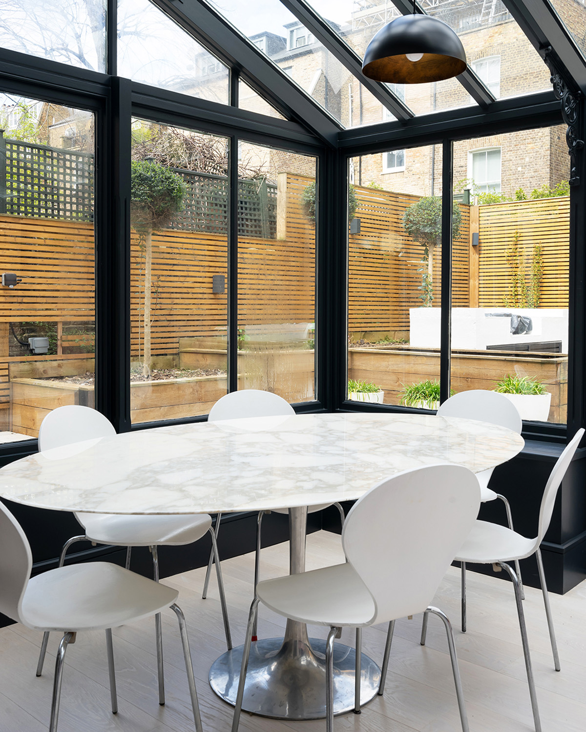 For Sale: Cambridge Gardens Notting Hill W11 Crittall windows and skylights with modern dining table