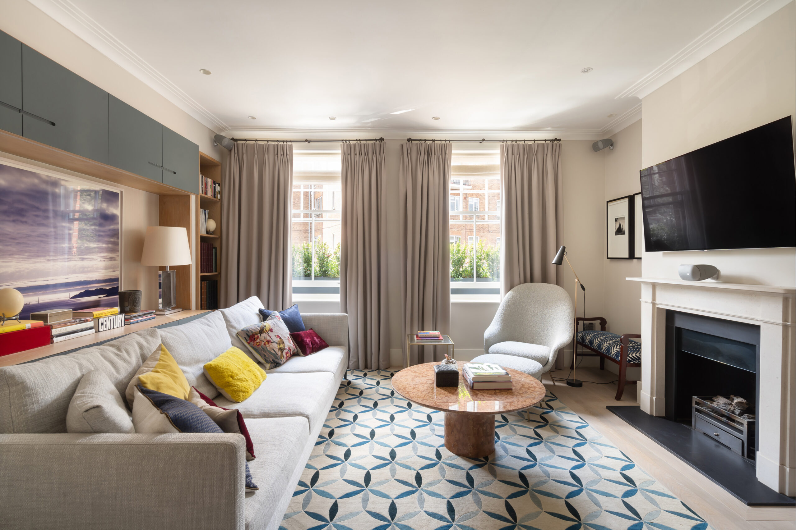 For Rent: Well Road Hampstead NW3 luxury living room with cream sofa and television