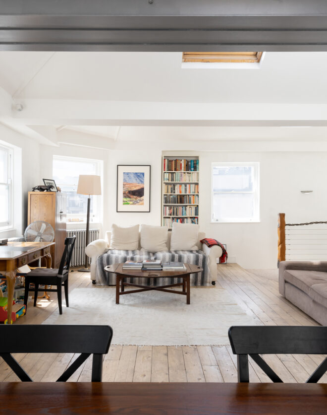 Luxurious open-plan living space of a two-bedroom apartment for sale in Notting Hill
