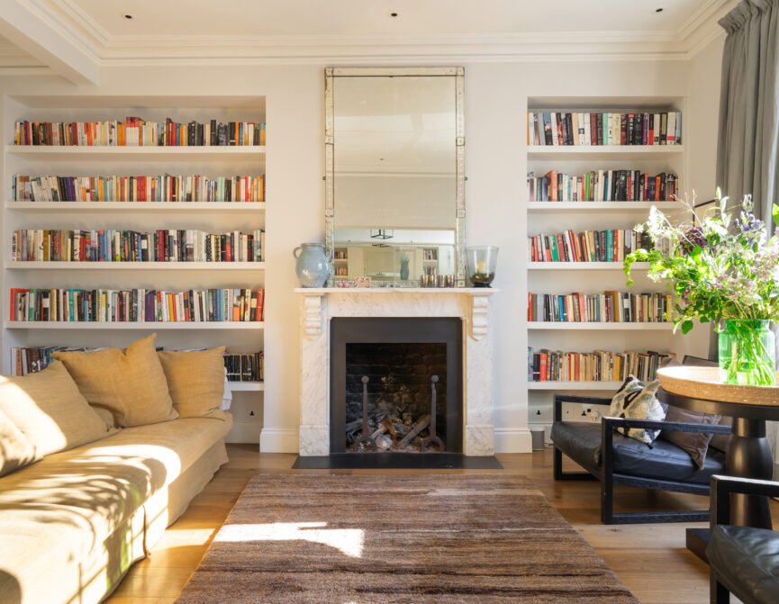 For Sale: Portland Road W11 Living Room with bookcases and fireplace