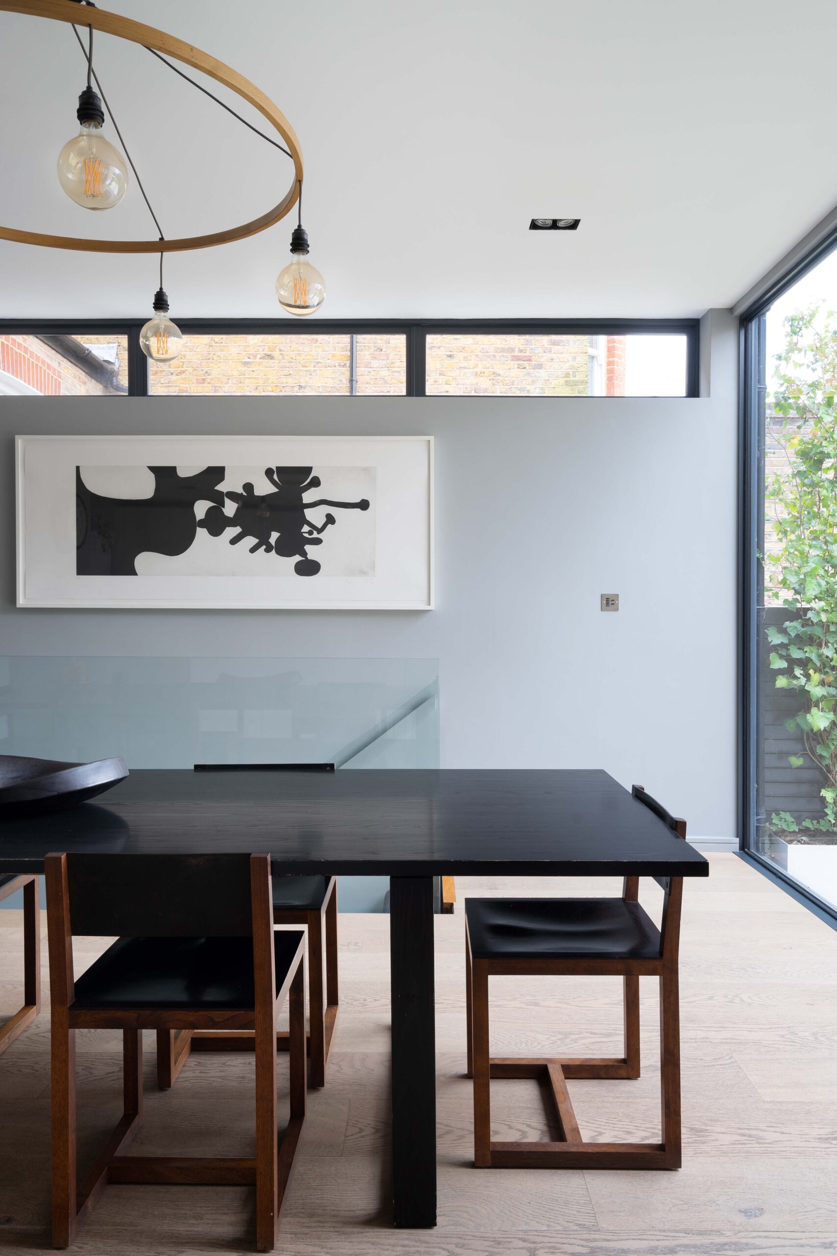Dining table and clerestory windows at St Quintin Avenue W10