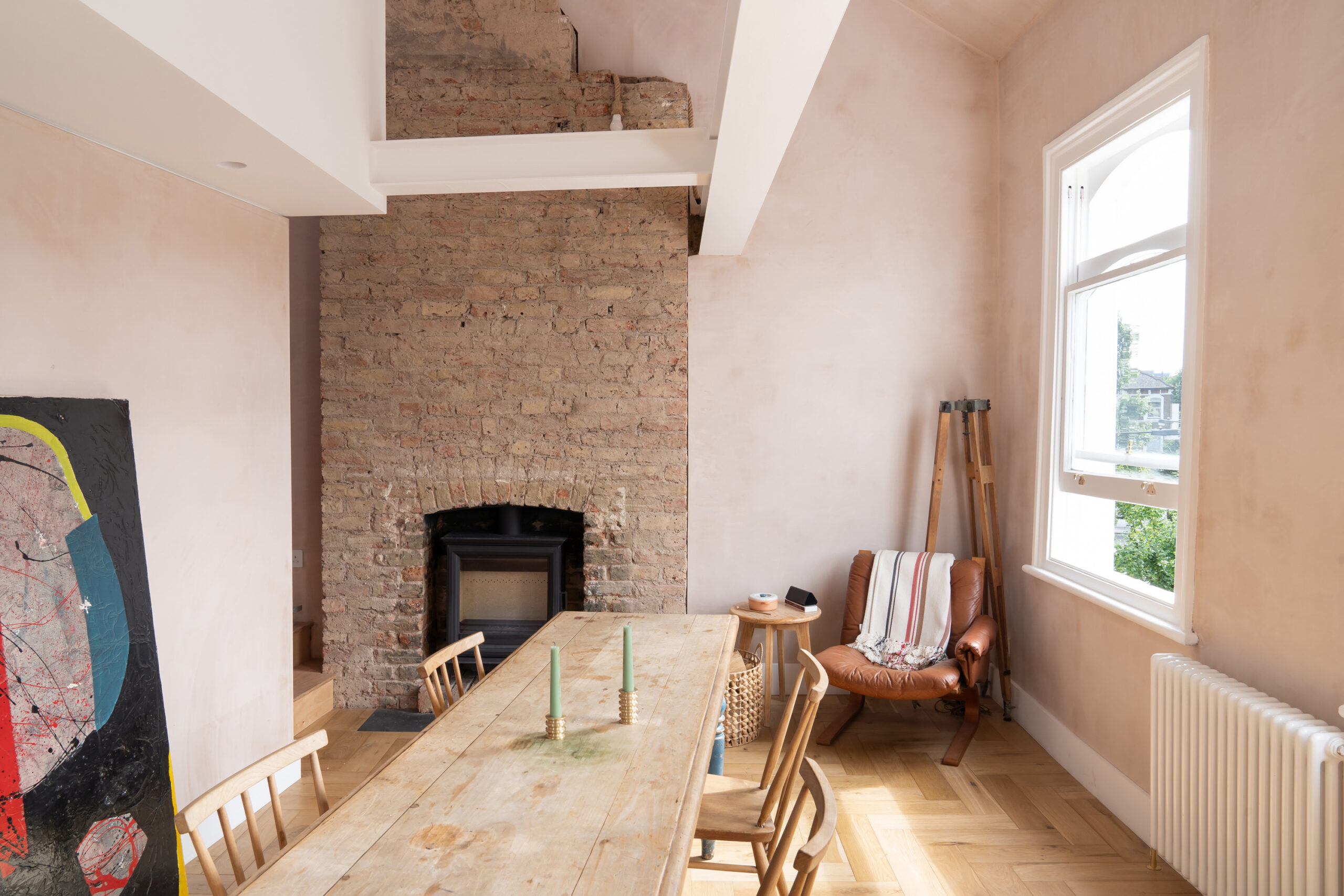 St Quintin Gardens North Kensington W10 exposed brickwork and pink plaster in dining room