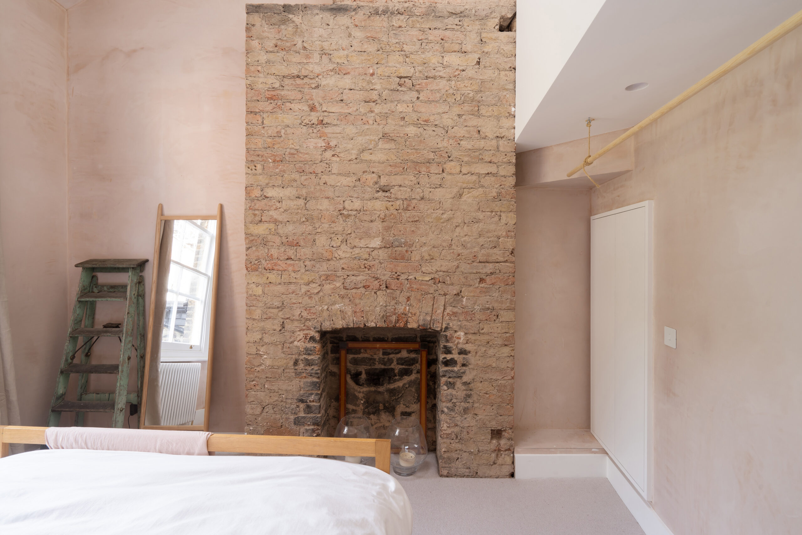 Master Bedroom exposed brick wall St Quintin Gardens