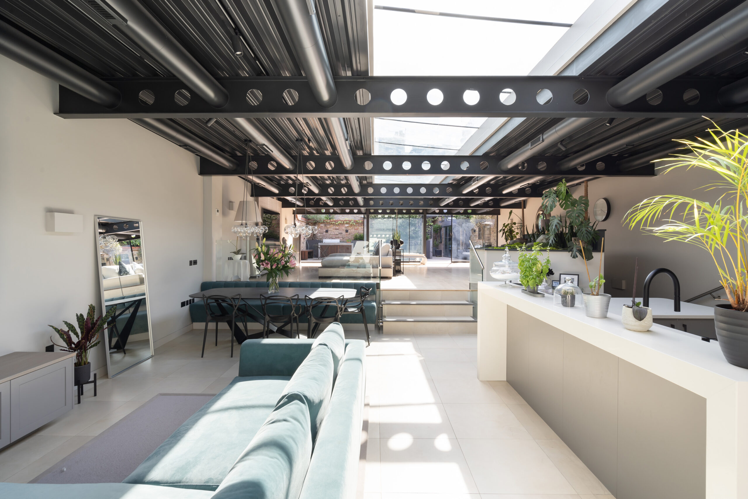 For Sale: Tilton Street Fulham SW6 industrial style reception room with steel ceiling and contemporary interiors