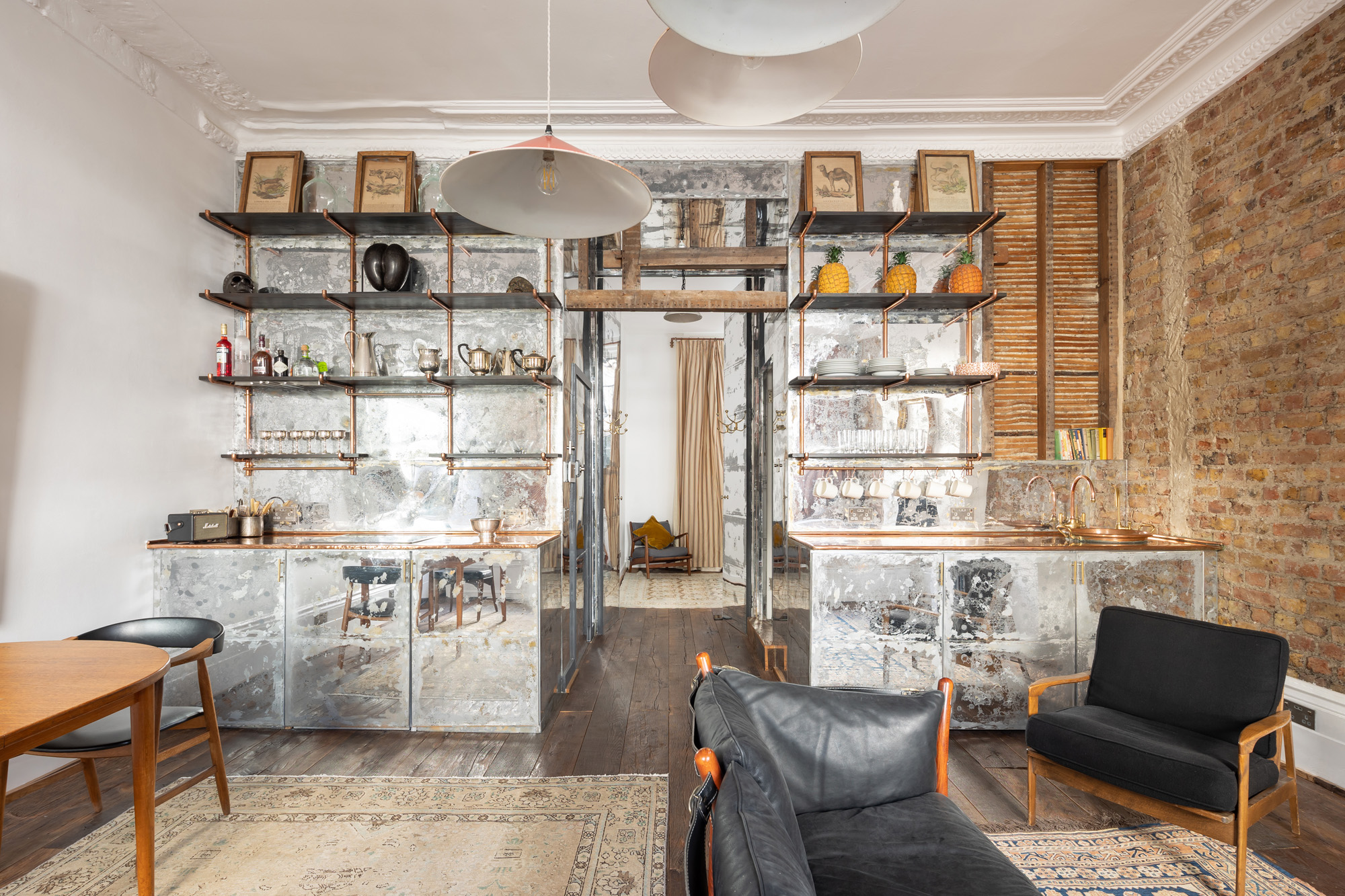 For Sale: Westbourne Grove Notting Hill W11A dramatic kitchen diner with mirrored cabinets