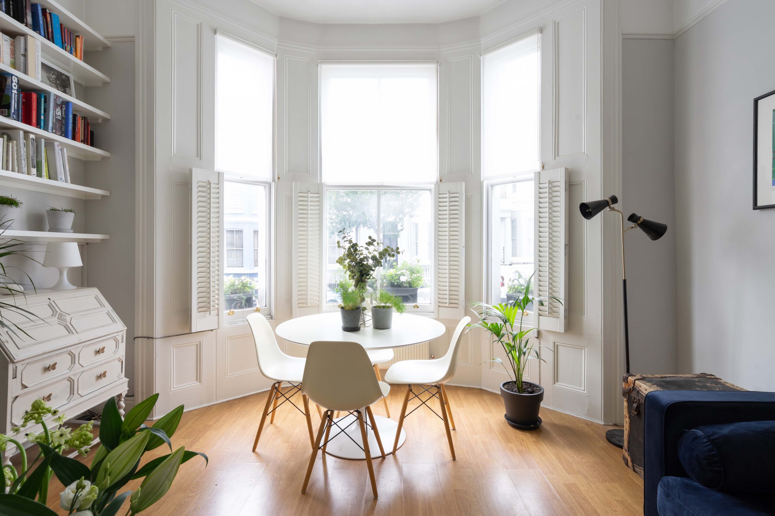 For Sale: Westbourne Park Road Notting Hill dining table in bay window with house plants