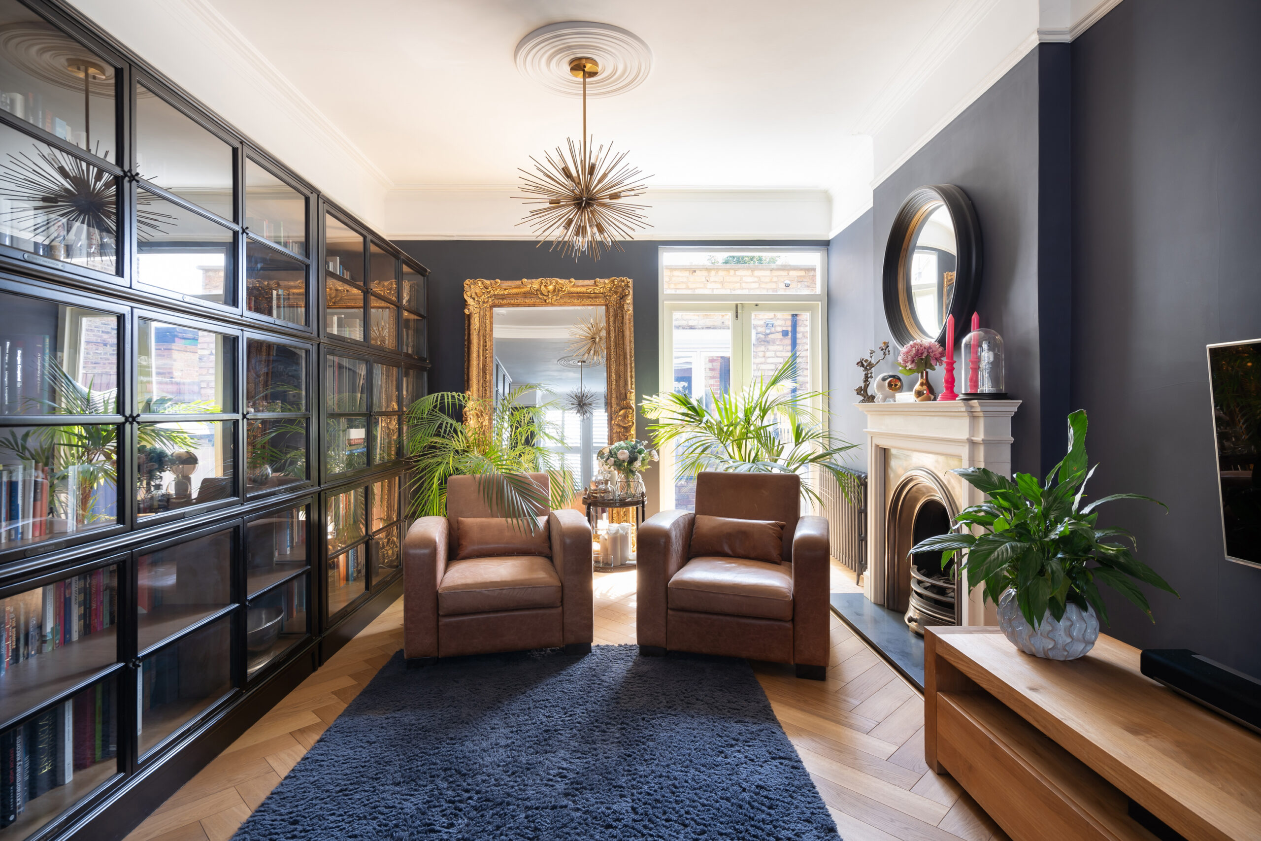 For Sale: Wormholt Road Shepherd's Bush W8 modern reception room with black-framed cabinets and stylish interior design
