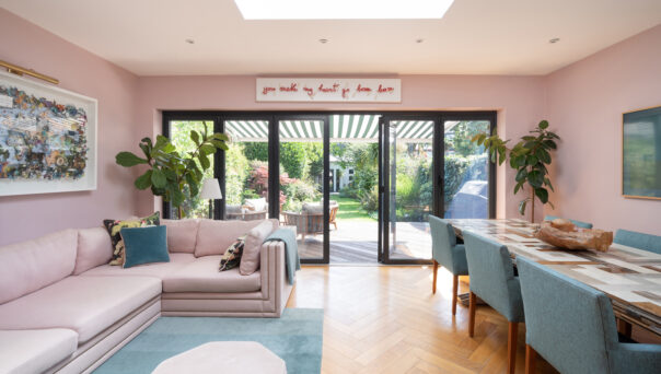 For Sale: Wormholt Road Shepherd&#039;s Bush W8 modern kitchen and living room with pink walls and a skylight