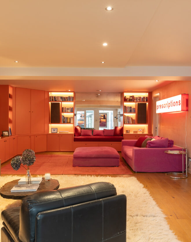 For Sale: Wornington Road North Kensington W10 living room with orange walls and leather sofas