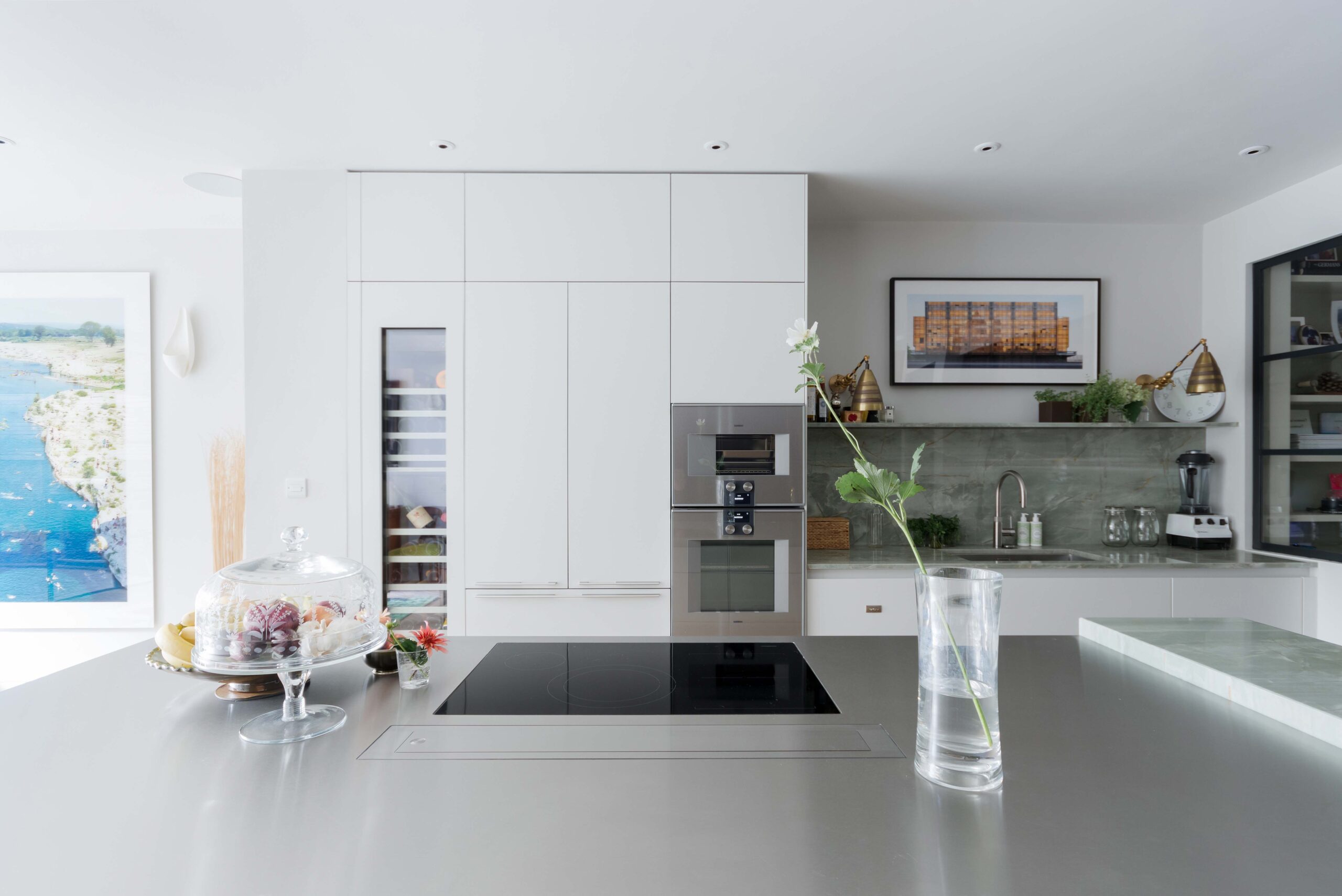 Hammersmith Grove contemporary kitchen with central island and whitewashed cabinets