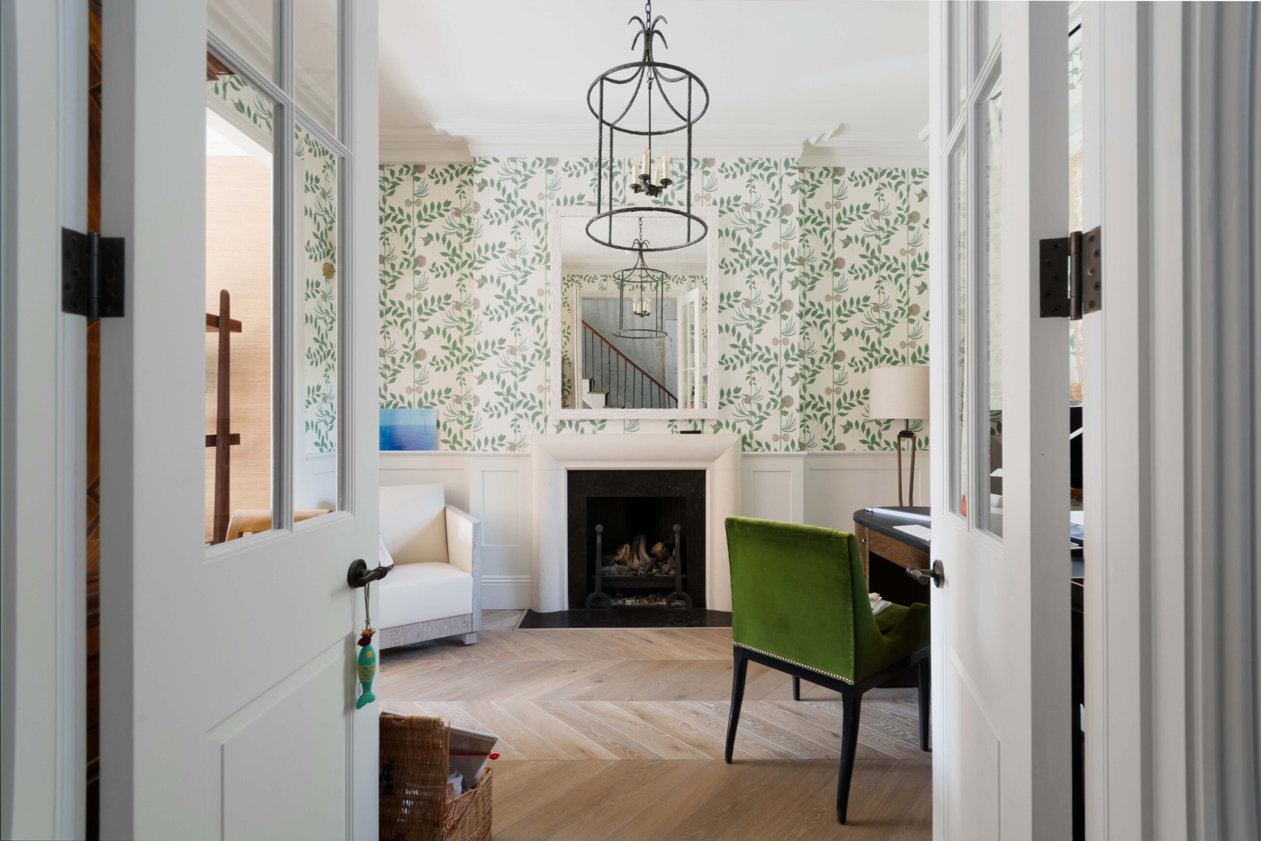 Hammersmith Grove's reception room with botanical wallpaper and double doors