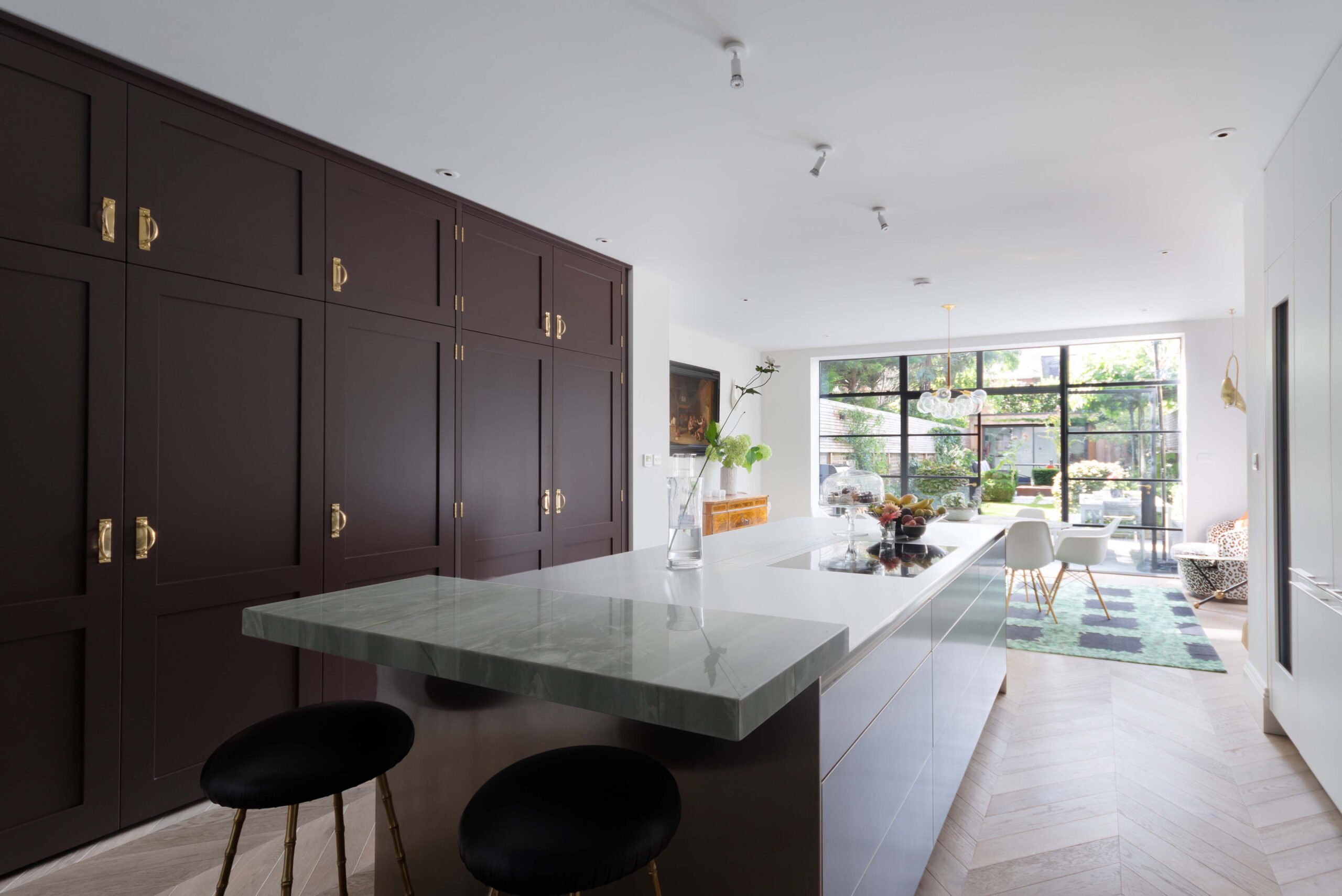 Hammersmith Grove contemporary kitchen with full-height storage and central island