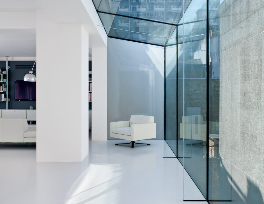 Luxury and contemporary architecture design by NGA in London: glass roof in corridor