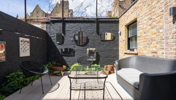 For Sale: Colville Road Notting Hill W11 patio garden with black brick wall