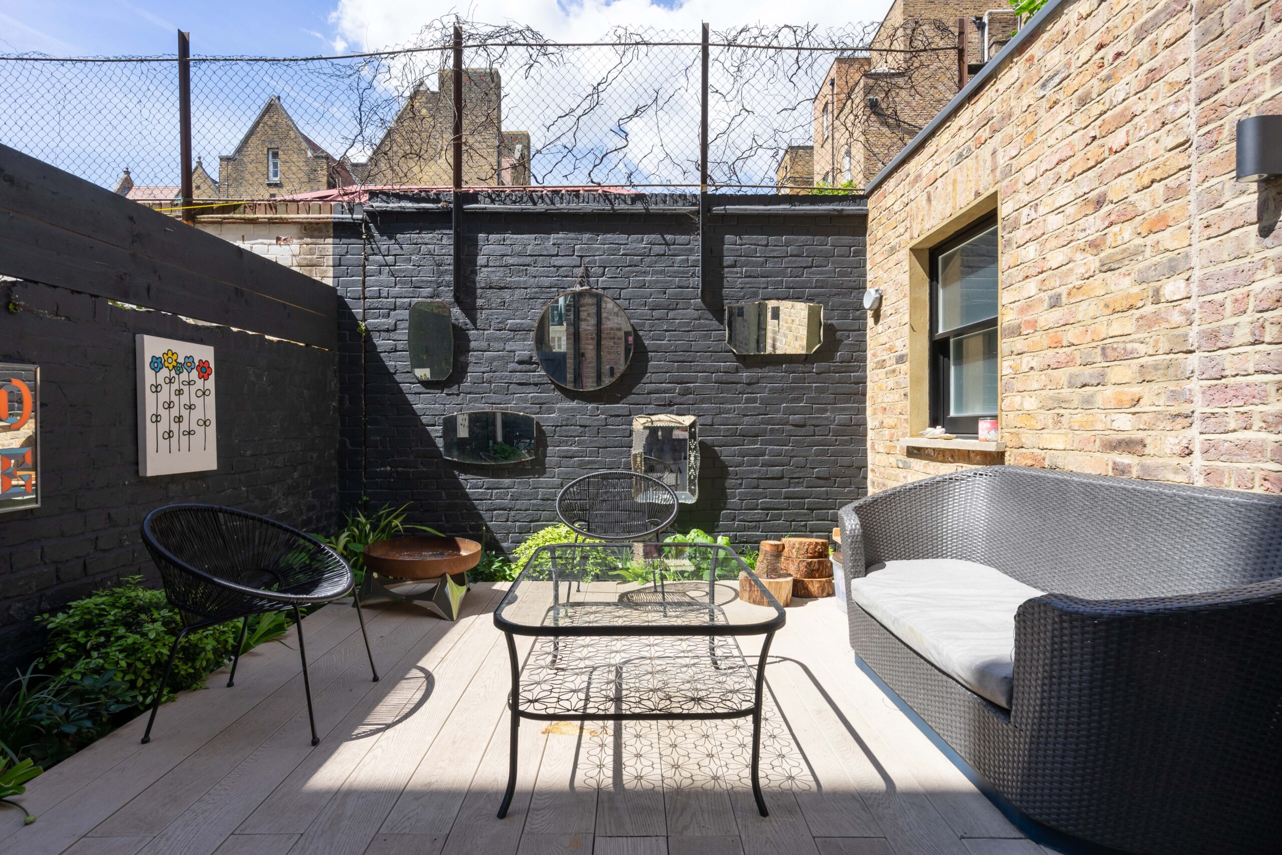 For Sale: Colville Road Notting Hill W11 patio garden with black brick wall