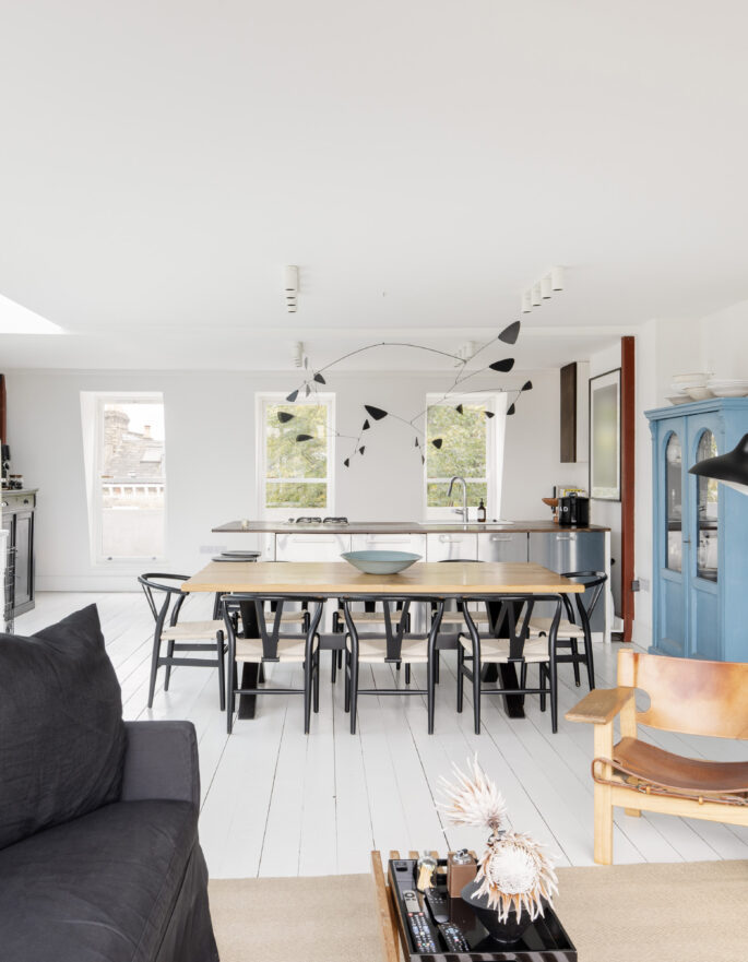 Bright open-plan kitchen, dining and reception room with a skylight, in a duplex apartment for sale